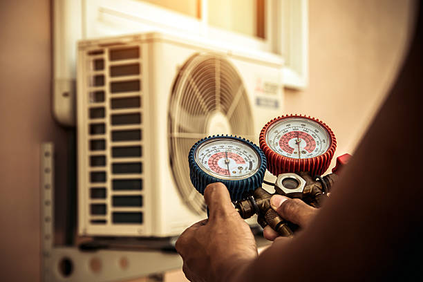 Professional Heat Pump Repair technician working in North Hoosick, NY